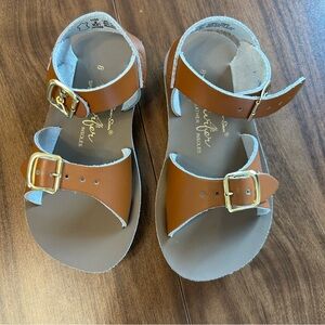 Worn once saltwater sandals in tan